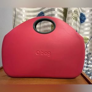 O Bag Hand rubber with Light Pink inner zip bag organizer.